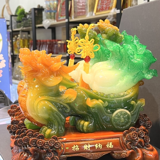 Tỳ hưu kéo bắp cải xanh